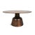 Modern round cast aluminum coffee table featuring a rich antiqued brass finish with beautifully aged character. Subtle...