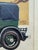 Vintage Lincoln Motor Company advertisement from 1928 featuring a classic luxury automobile beneath an elegant exotic bird...