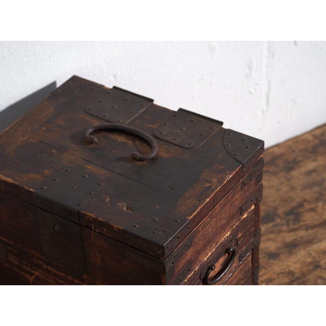 Small Japanese ko-dansu cabinet with hinged lid and front drawers made of paulownia wood (Paulownia spp.), originating...