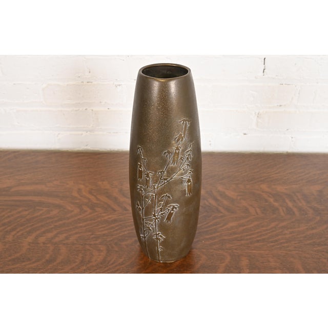 A beautiful Arts & Crafts period tall bronze vase with sterling silver overlay By Silver Crest (the mark of Smith Metal...