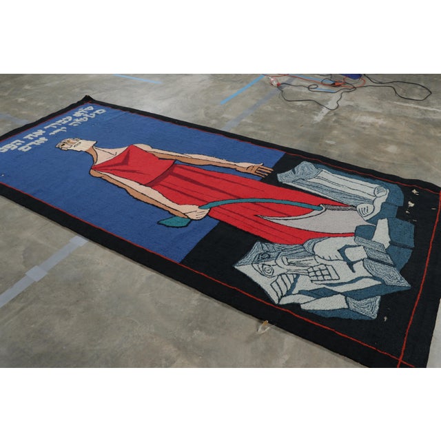 Made with handtufted wool circa 1960-1970, this 5x12 vintage tapestry is an exciting new addition to Rug & Kilim's...