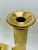 A regal arrival for your dining table, mantle or entry way. This set of solid brass fluted candlesticks include a felt...