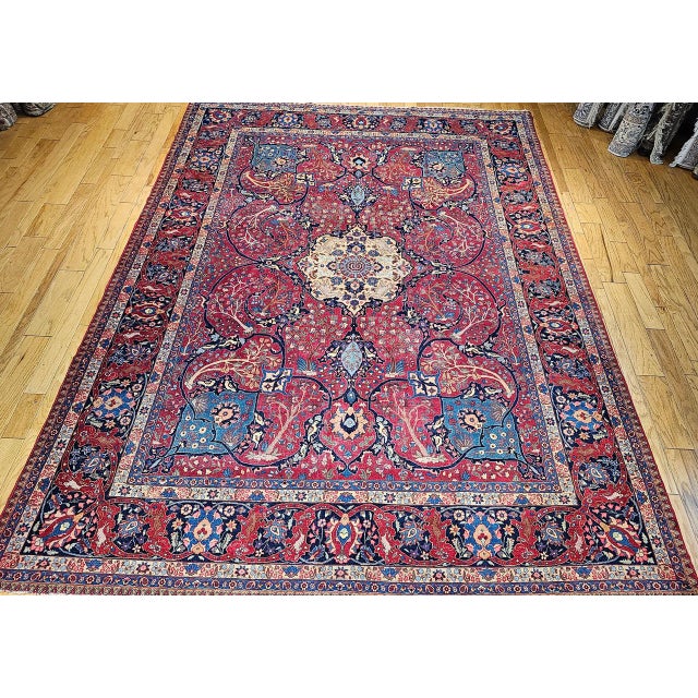 "This extraordinary vintage Persian Tabriz rug is a testament to the rich weaving traditions of its historic city. Set...