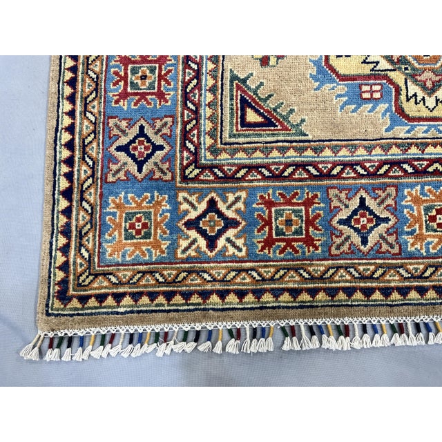 Textile Beige Persian Style Kazak Wool Rug With Blue Border, 4'2" X 5'10" For Sale - Image 7 of 14