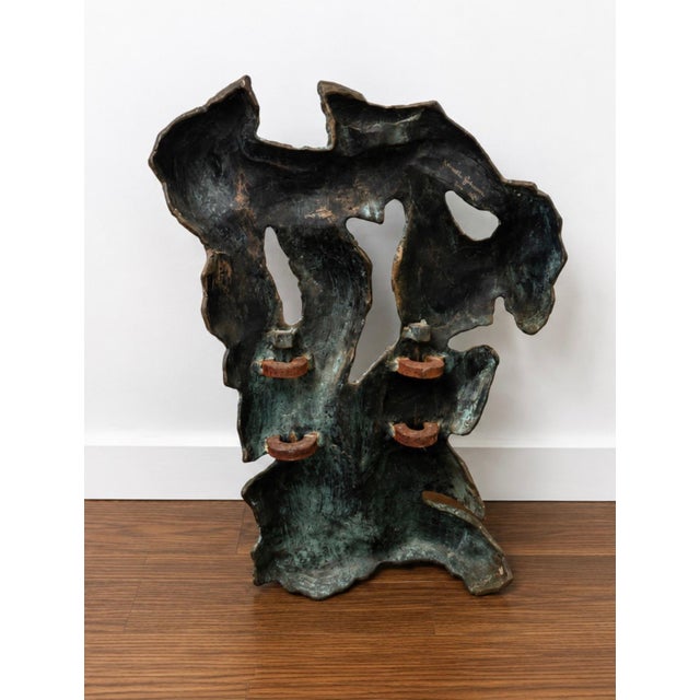 Vintage verdigris bronze sculpture featuring patina, finish resembling modernist figurative works - abstract organic form....