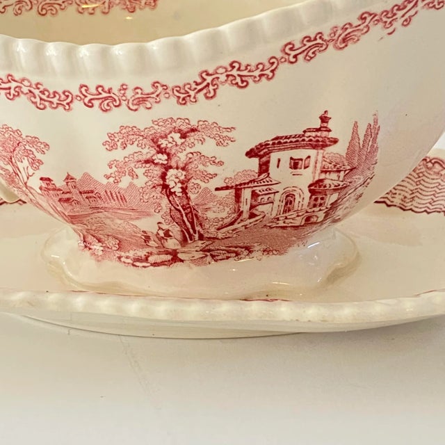 Gorgeous old transferware from Adams China, circa 1950. This wonderful gravy boat and attached underplate has a scalloped...