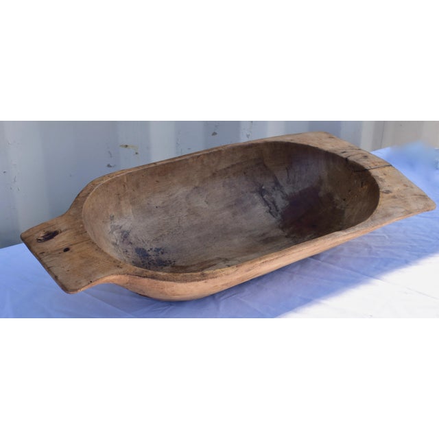 Our European antique wooden dough bowls or trogs were hand-hewn from whole split logs. They feature remarkable handiwork...