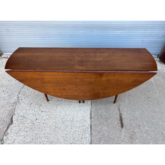 Heritage-Henredon Walnut Gate-Leg Table. Top has been refinished in last 10 years or so and still looks very good! Very...