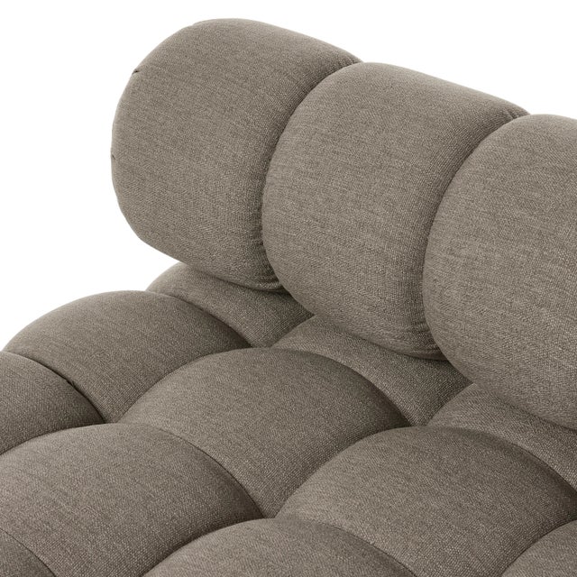 A modern take on mid-century Italian design, soft volume and exaggerated proportions fuse for a sculpted look and playful...