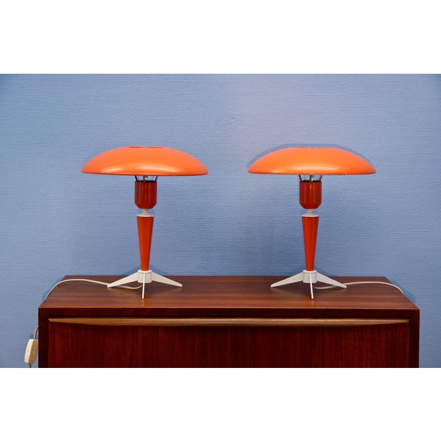 Dutch Bijou Table Lamps in Orange by Louis Kalff for Philips, 1960s, Set of 2, in Very Good conditions. Designed 1960 to...