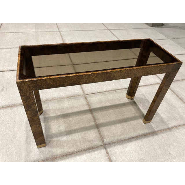 Parsons style sofa or console table, manner of Milo Baughman, Mastercraft, or John Widdicomb. Featuring solid hardwood...