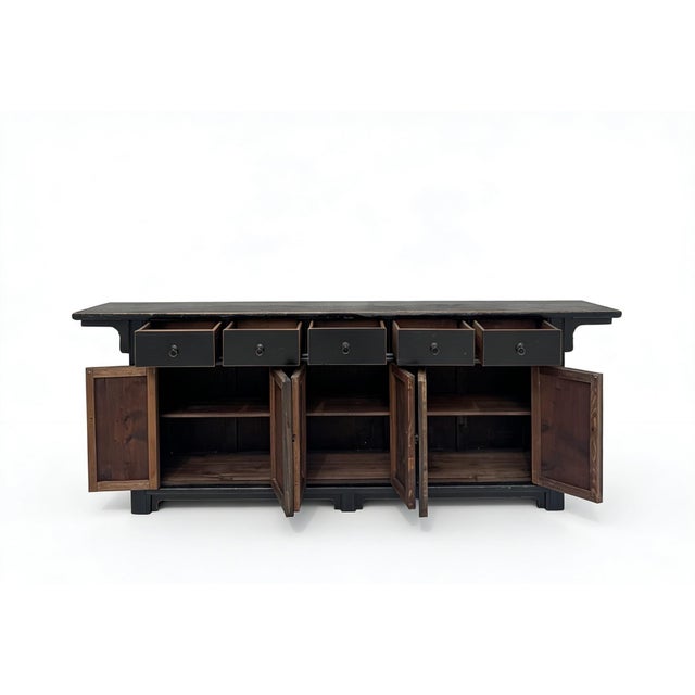 This 18th century sideboard was handmade from sturdy elm and features a distressed black finish with a 3 section door...