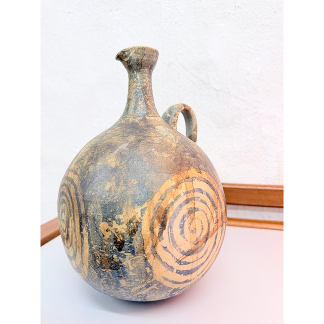 One vase with a handle, dating from the 1970s, signed by Gerhard Liebenthron (GL 73). Ceramic. Good used condition. 26 x...