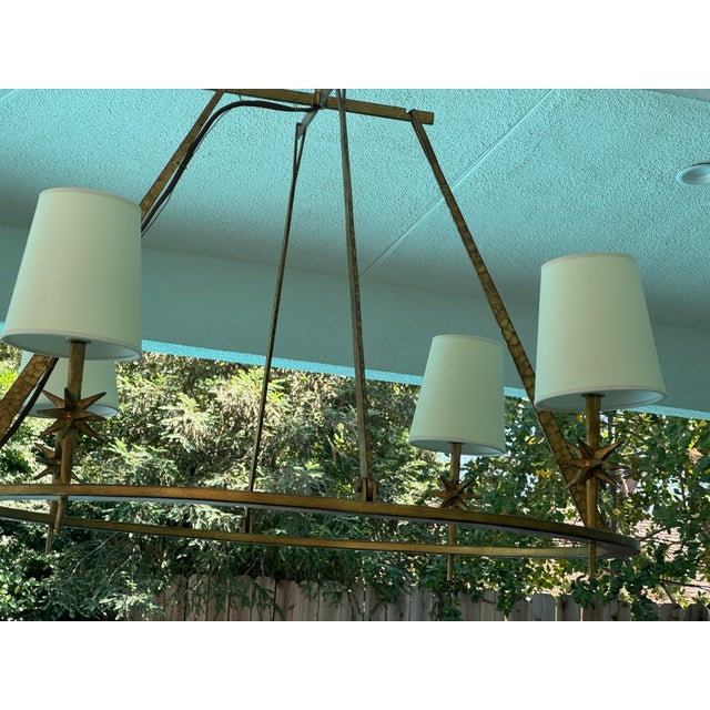 A beautiful brass and unexpected starbursts perched along the graphic lines. Its decorative nature, paper shades and...