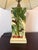 Playful Regency-style table lamp by Wildwood, featuring hand painted tropical leaves with monkeys climbing among them....