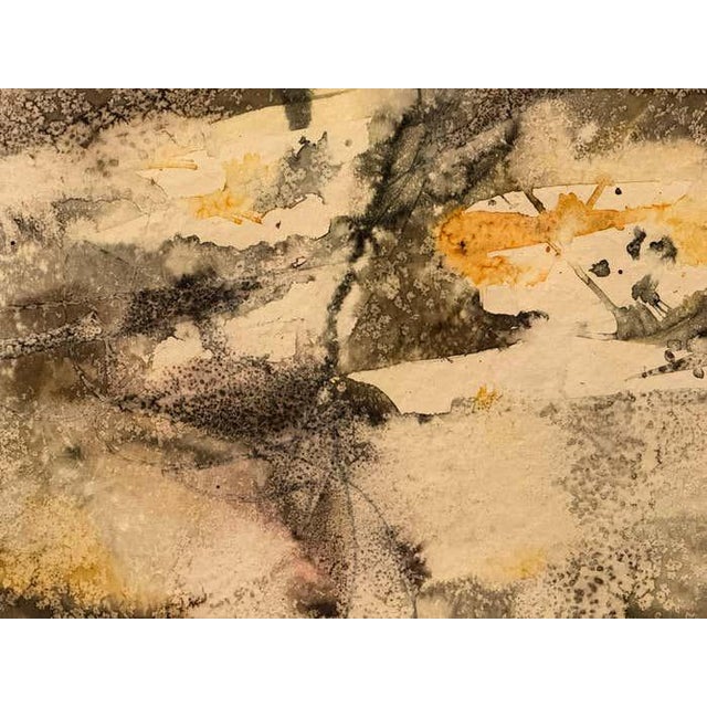This acrylic painting is a richly textured abstract study in hushed ochres, grays, and parchment tones. The work layers...
