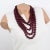 This superb Angela Caputi, made-in-Italy resin choker necklace features an oversized multi-strand design with lovely red...