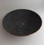 A striking low decorative bowl combining spun copper with a genuine black stingray shagreen interior. A single pearl is...