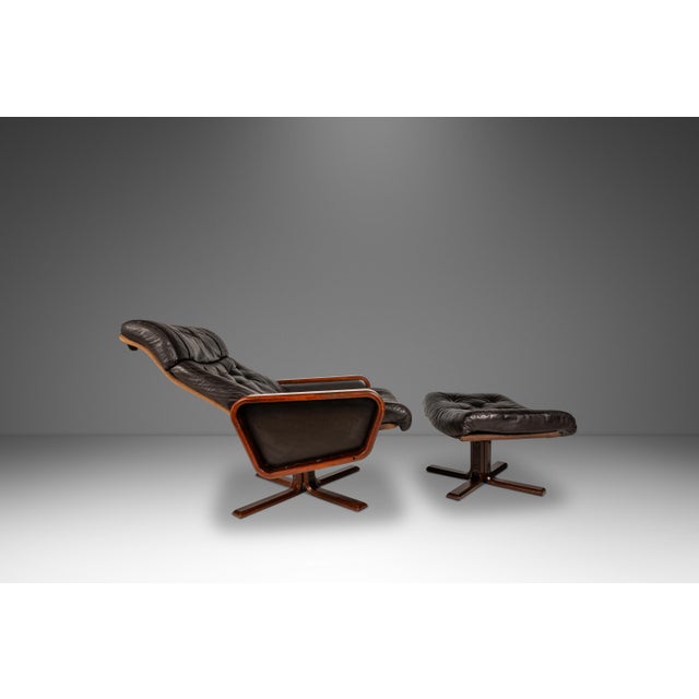 Introducing an extraordinary Scandinavian Modern lounge chair and ottoman set that is as comfortable as it is visually...