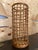 Handwoven umbrella stand in rattan in the style of Louis Sognot. Large size, tall piece in excellent original condition. A...