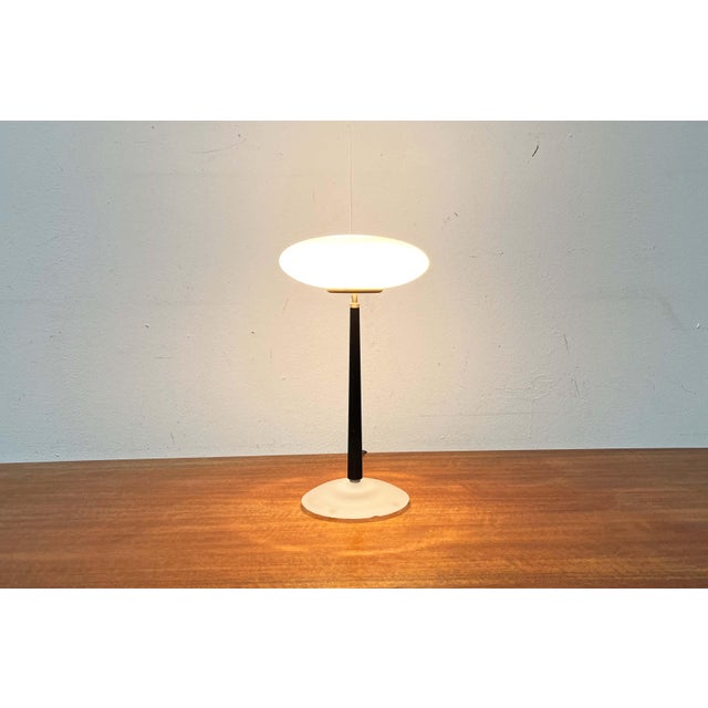 The small T1 table lamp version from the Pao lighting series by Matteo Thun. This is a rare version with a high-gloss...