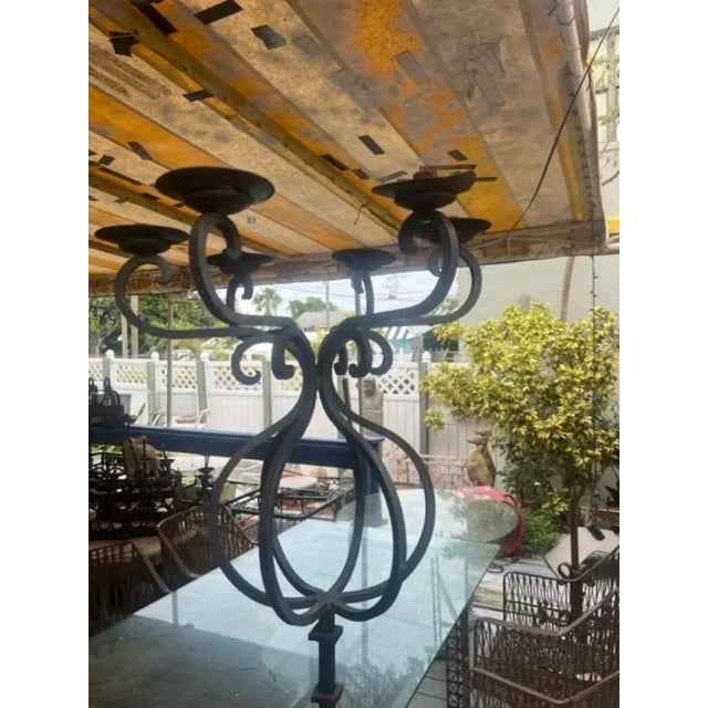 Add a touch of elegance to your living space with this French-style brass candle holder. Standing tall at six inches, it...