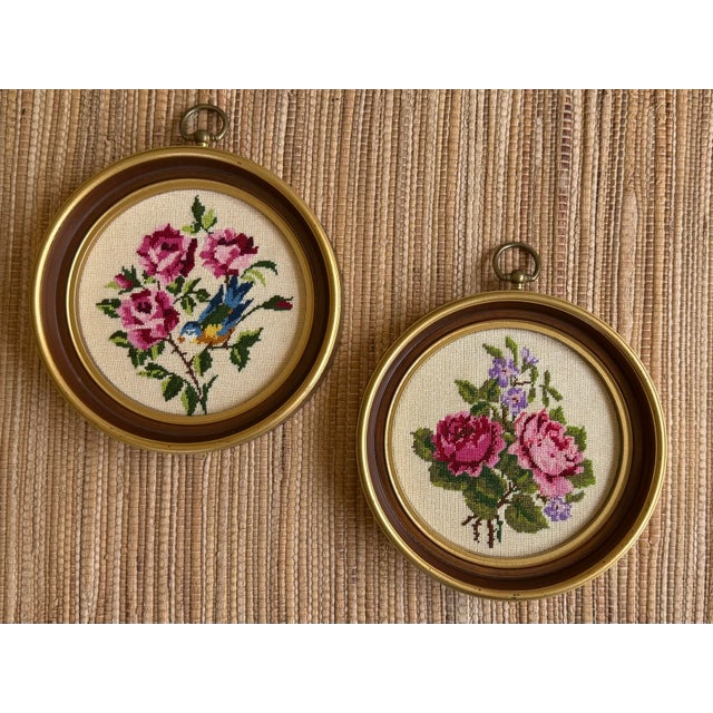 A pair of lovely handmade petit point embroideries featuring colorful pink roses and a blue bird. Circa 1960s/70s. Each is...