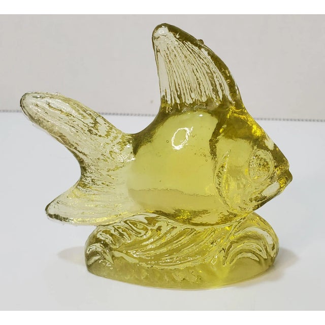 Color: Yellow (manganese glass) Date Produced: Mid 20th Centurt Shape: Angle Fish