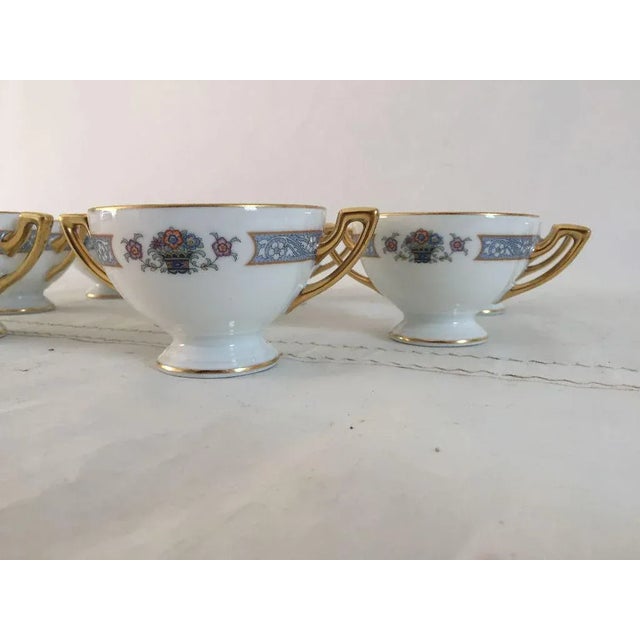 Vintage elegant, floral fine china set of eight bullion soup cups, makers mark reads" Thomas Bavaria, Brunswick" in...