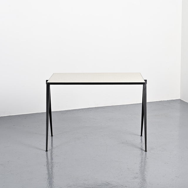 Pyramid desk designed by Wim Rietveld in the Netherlands in the late 1950s. The rectangular top, covered in white Formica...