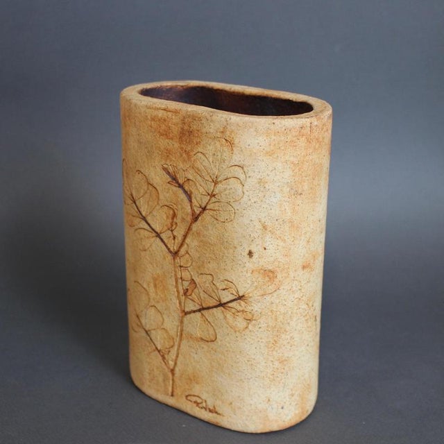 Vintage stoneware vase by raymonde leduc (circa 1960s-70s). A light sandstone coloured vessel with plant motifs - the...