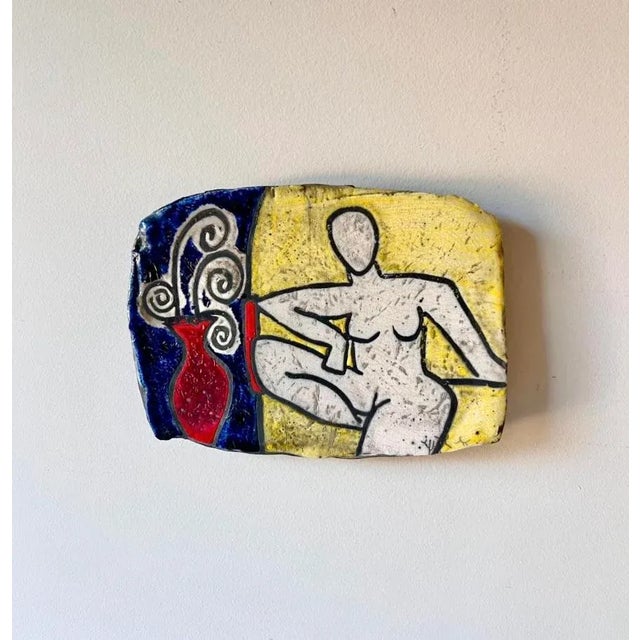Signed ceramic wall tile by Marina Bosetti. This vintage piece is original to their North Carolina ceramics studio. The...