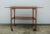 Vintage Scandinavian modern rolling teak bar cart designed by Yngve Ekstrom, made in Sweden. Beautiful functional serving...