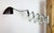 This vintage adjustable gooseneck industrial scissor wall light was produced by Elektroinstala in former Czechoslovakia...