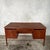 A substantial mid-century Danish-style teak twin pedestal executive desk dating from the 1960s. Designed to be viewed from...