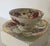 This beautiful vintage Royal Sealy Japan teacup and saucer set features lush multicolor roses in shades of burgundy, pink,...