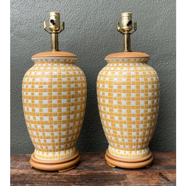 Elevate your space with this striking pair of vintage ceramic table lamps, featuring a vibrant yellow and white mosaic...
