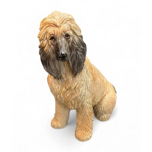 This Italian ceramic statue captures the regal essence of the Afghan Hound breed. Standing at an impressive 31 inches...