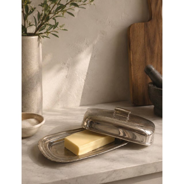 A handsome Reed & Barton silver plate covered butter dish in the classic Embassy pattern, model #1142 — marked clearly on...