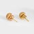 Stylish vintage Portuguese textured button earrings crafted in 19k yellow gold (circa 1960s). The chic earrings are...