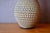 Recognizable by its hand-scarred surface, this Alfred Krupp terracotta vase dates from the 1970s. A good size, the vase's...