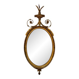 Early 20th Century Adam Style Neoclassical Giltwood Oval Mirror With Urn Crest For Sale