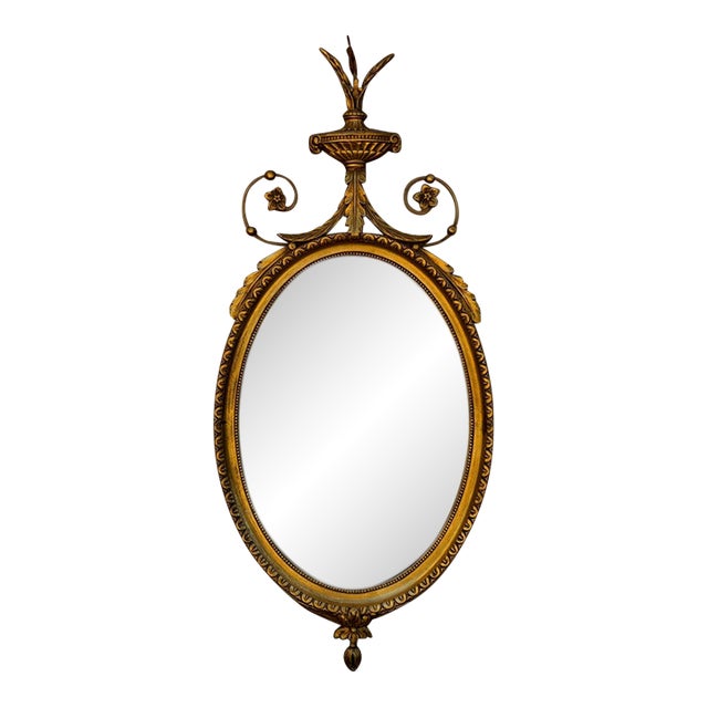 Early 20th Century Adam Style Neoclassical Giltwood Oval Mirror With Urn Crest For Sale