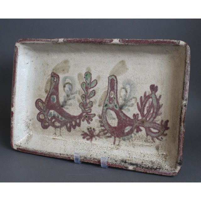 Vintage French ceramic tray by Gustave Reynaud for Le Mûrier (circa 1960s). Rectangular-shaped tray with slightly rounded...