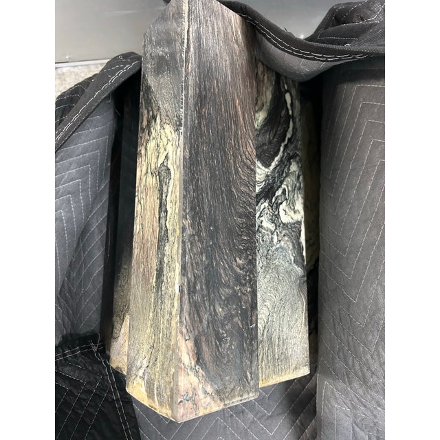 Gorgeous vintage Italian marble coffee table, tear drop shaped top that rests on two architectural bases. Veining is lovely.