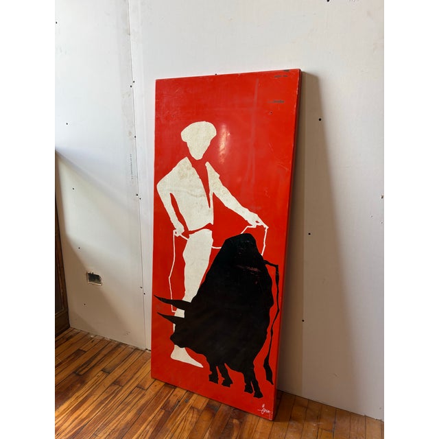 Bold metal wall panel with high-contrast, gestural matador and bull silhouette. Signed by the artist "YESH." Vibrant...