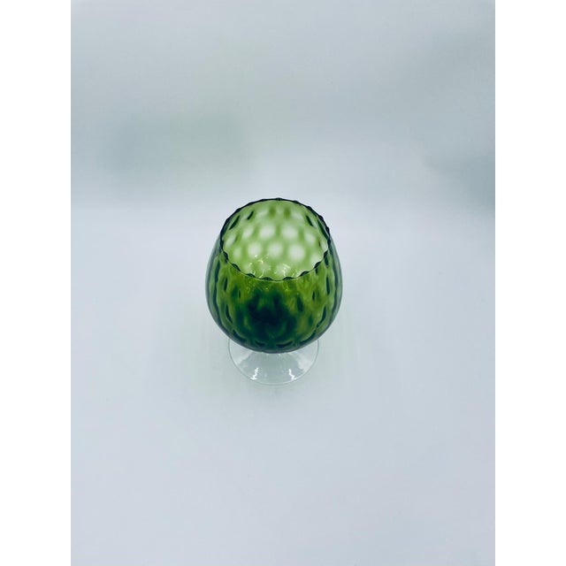 A chalice, an Empoli-style vase from the 1960s/1970s, made of high-quality art glass. The chalice features a bulging bowl...