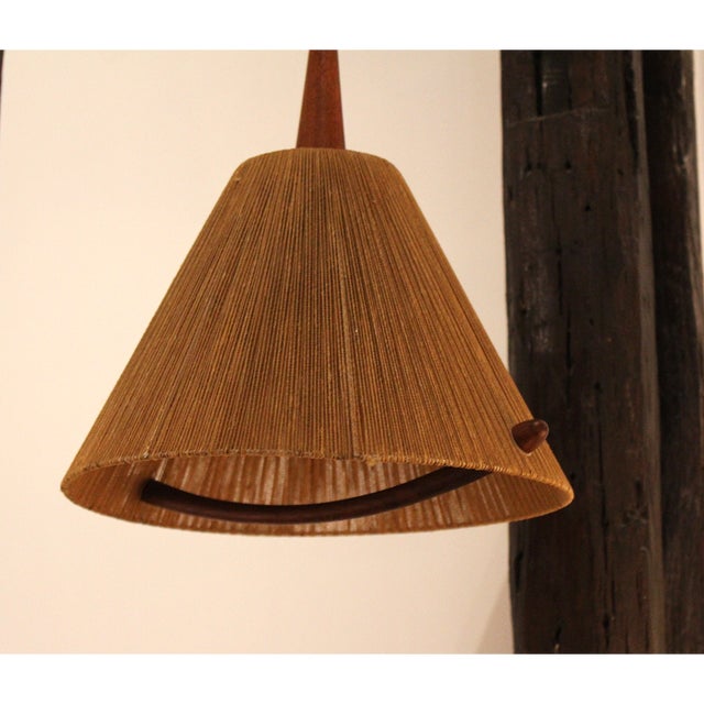 Vintage Scandinavian Pendant Light in Raffia and Teak from Temde, 1960, in Good conditions. Designed 1960 to 1969 This...