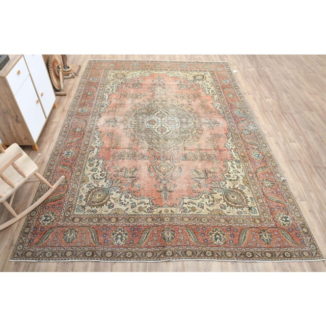 Vintage Persian Hand-Knotted vintage rug is a semi-antique vintage area rug. The '70s Eastern region of Turkey's unique...