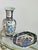 Add a touch of classic Japanese artistry to your home with this beautiful vintage Royal Satsuma two-piece set, featuring a...